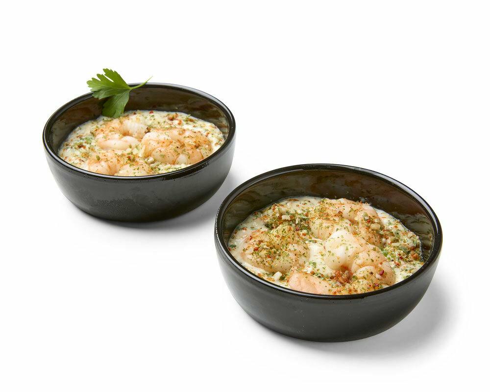 Pannetjes gestoomde scampi in looksaus  (2 stuks)